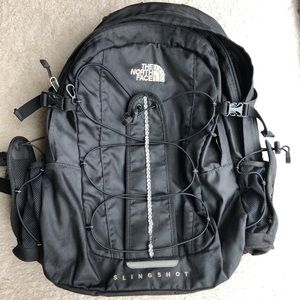 Black North Face Slingshot Backpack with Crystals